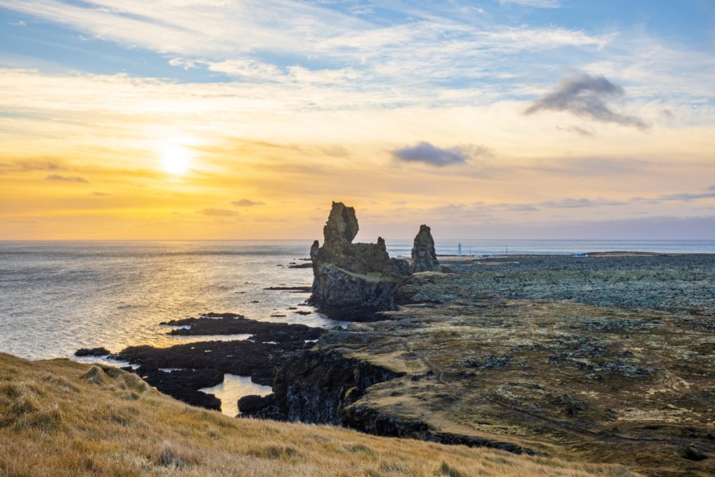 A short walk up a paved path leads to a viewpoint of the rock formation Lóndrangar. Beautiful, but skippable.