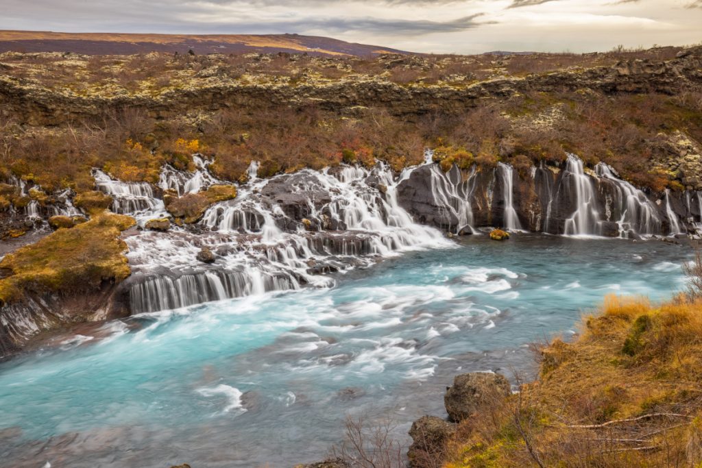 Hraunfossar: The outlet of the water dripping through the Víðgelmir Lava Tube Cave.