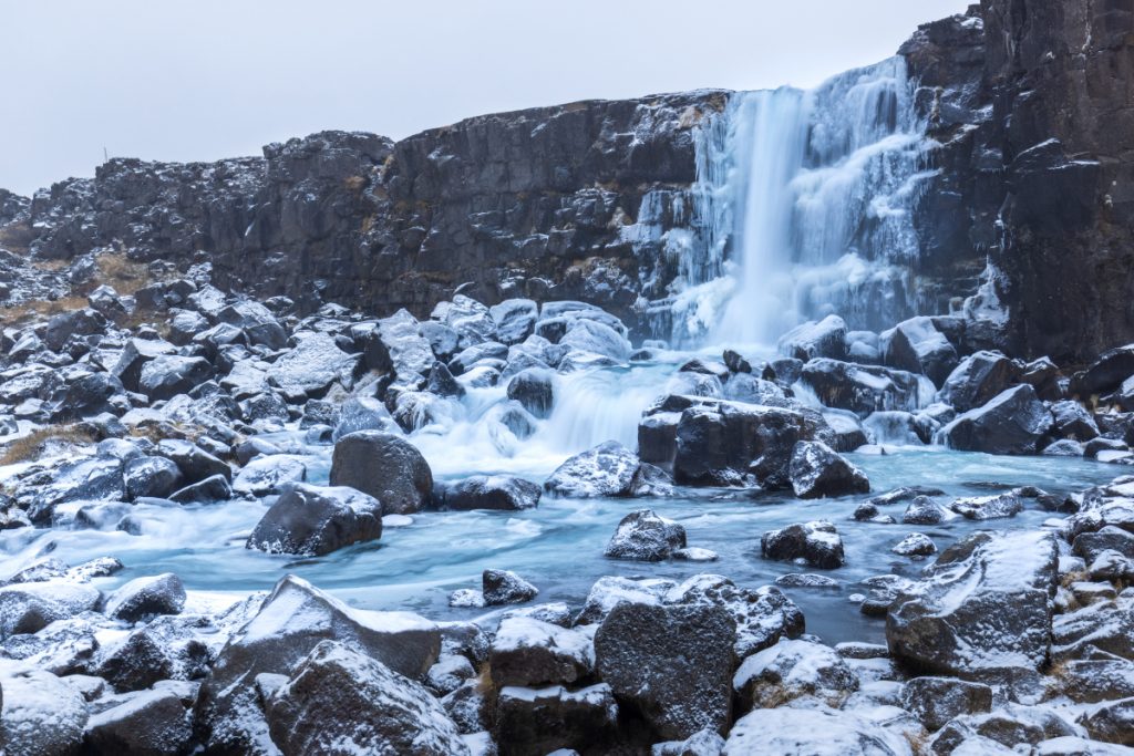 The icy waterfall Öxarárfoss.