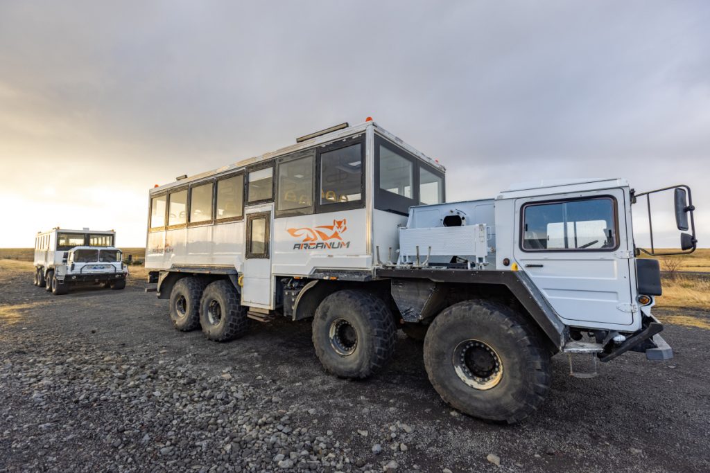 A huge vehicle used to transport passengers up a glacier.